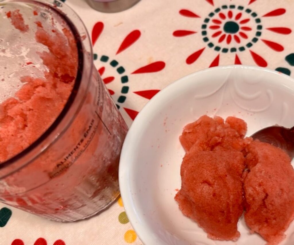 a bowl of cherry cola italian ice