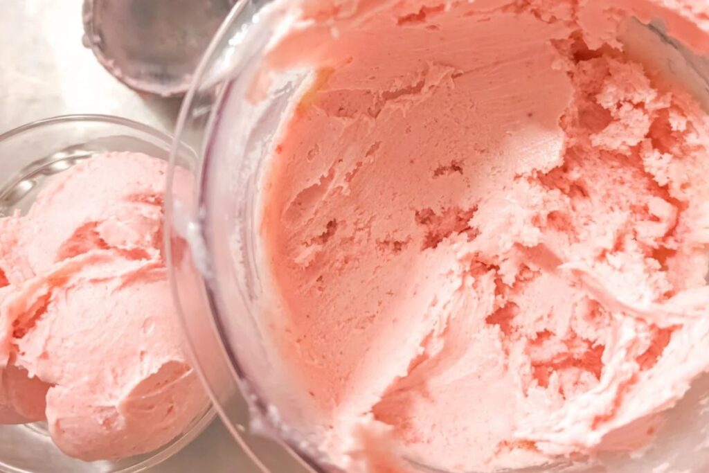 a bowl of strawberry rhubarb ice cream