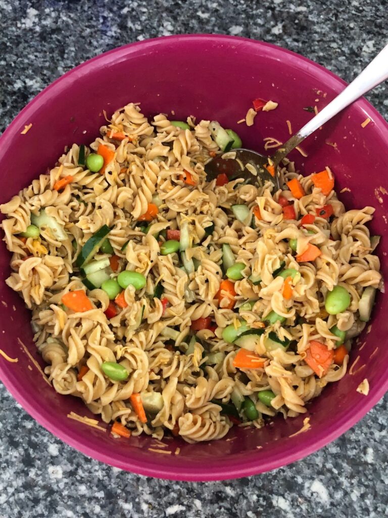 a large bowl of pasta salad